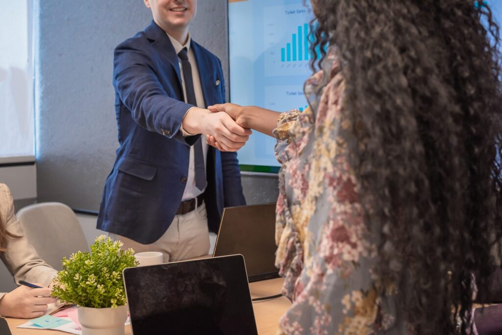 Featureimage business man shake hands with business women agree 2025.jpg