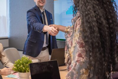 Featureimage business man shake hands with business women agree 2025.jpg